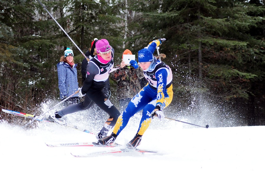Heidi Widmer (l) and Andrea Dupont after colliding at a NorAm sprint last January in Thunder Bay, Ontario. Widmer suffered a mild concussion, but qualified for the U23 World Championships as a discretionary pick and was fully recovered in five days. Photo: John Sims. faster skier.com