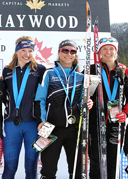 Fort McPherson's Annah Hanthorn, left, stands on the podium with Sophie Carrier-Laforte of Quebec and Ember Large of Alberta after the junior girls 10-km medal presentation at the Haywood Ski Nationals in Whistler, B.C., on March 26. Hanthorn was the silver medalist in the event. -James Cunningham, Cross Country Canada photo