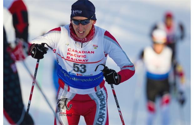 Jeff Holmes of the Foothills Nordic Ski Club rushes up a hill during the Master Men 3-4 10km Alberta Cup race held at the Strathcona Wilderness Centre on Dec 20, 2014. Photograph by: Topher Seguin